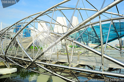 Image of Helix Bridge and downtown of Singapore