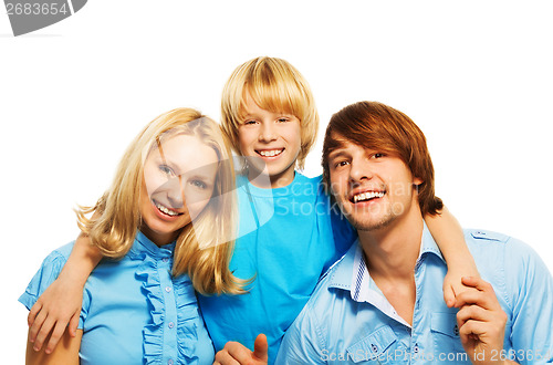 Image of Little blond boy with loving parents