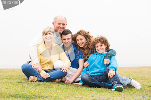 Image of Happy family posing together