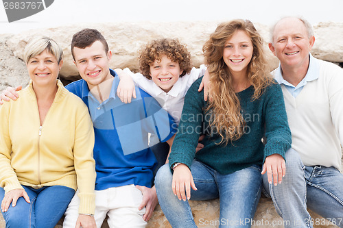 Image of Family having fun on beach holiday