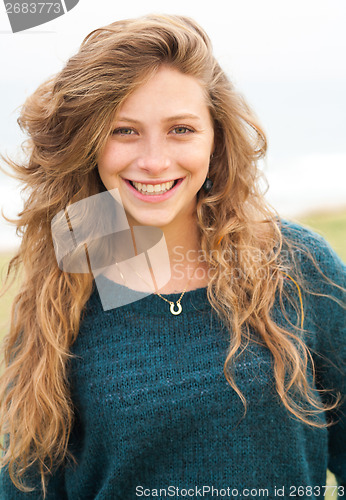 Image of Young woman outdoors portrait