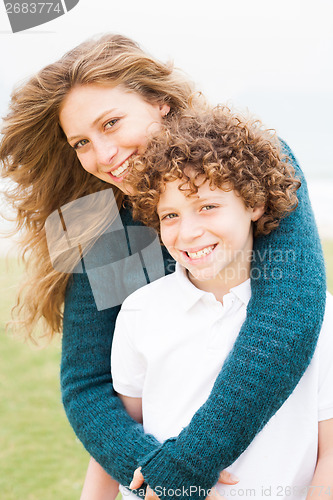 Image of Happy young mother with son