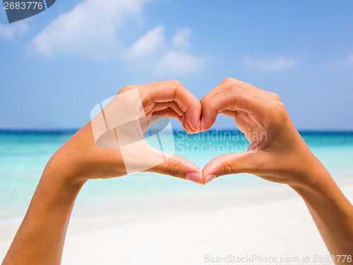 Image of Heart shape against a beautiful blue sky