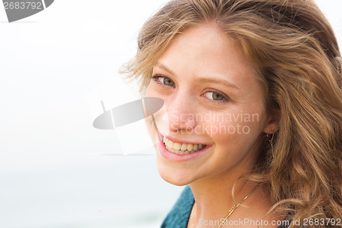 Image of Beautiful smiling woman outdoor portrait