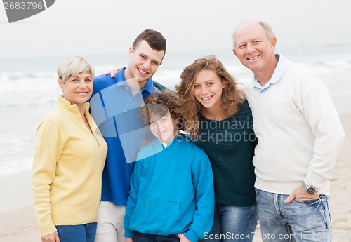 Image of Family enjoying weekend at the beach