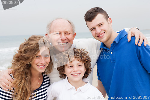 Image of Happy smiling family on beach vacation