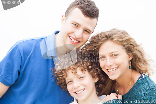 Image of Happy family smiling together