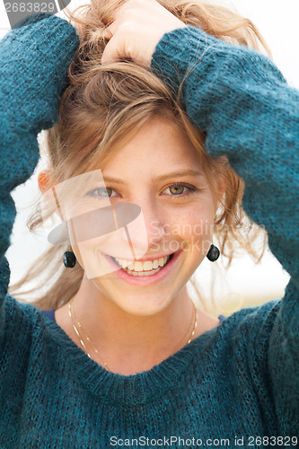 Image of Portrait of smiling beautiful girl