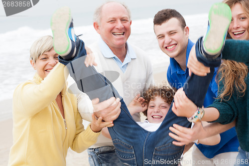 Image of Family having fun at beach