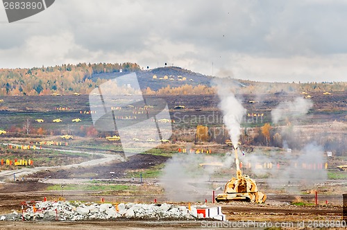 Image of The 152 mm howitzer 2S19 Msta-S shooting. Russia