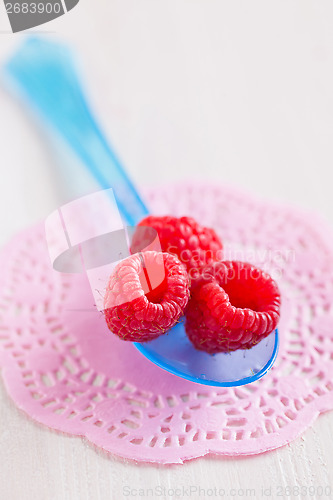 Image of Three fresh raspberries