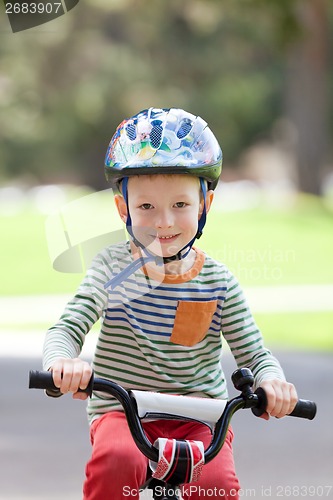 Image of kid biking