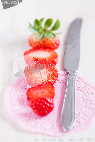 Image of Sliced strawberry and knife