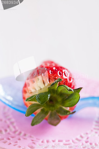 Image of Fresh whole strawberry and spoon