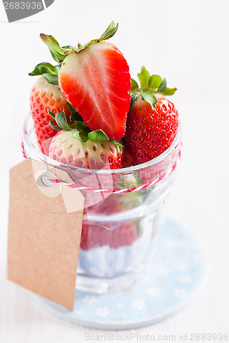 Image of Fresh strawberries in glass with tag