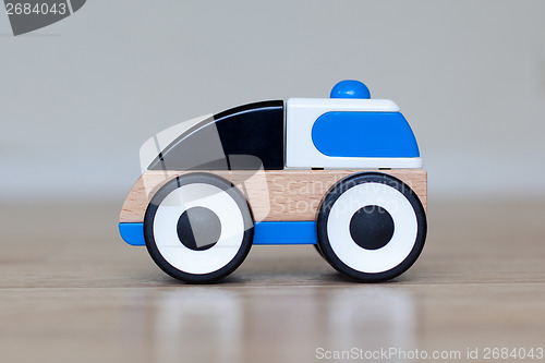 Image of Simple wood and plastic toy police car