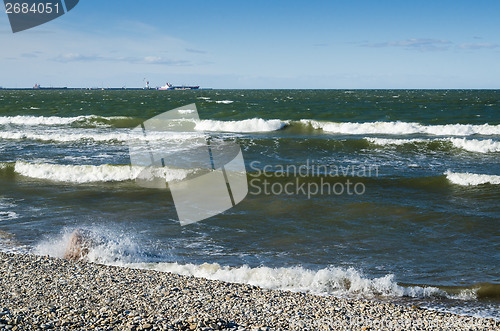 Image of Sea waves lapping on the shore. Baltic Sea.