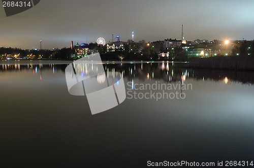 Image of night Helsinki, the reflection in the water, Finland