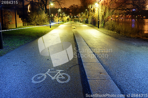 Image of bike path in the park night city, Helsinki