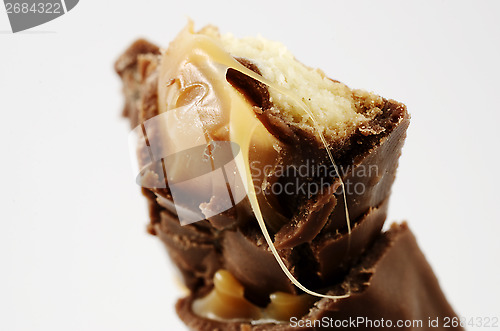 Image of half a chocolate bar with caramel