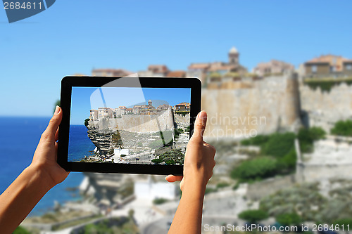 Image of photography with tablet