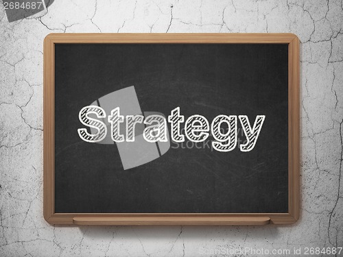 Image of Finance concept: Strategy on chalkboard background
