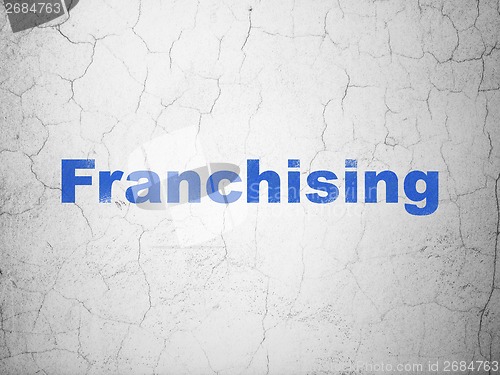 Image of Finance concept: Franchising on wall background