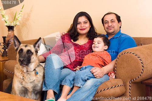 Image of East Indian Couple with their son and dog