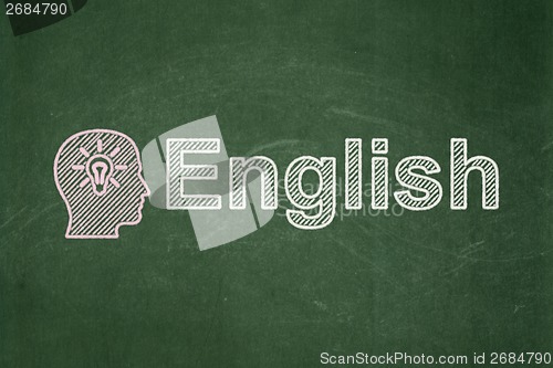 Image of Education concept: Head With Light Bulb and English on chalkboard background