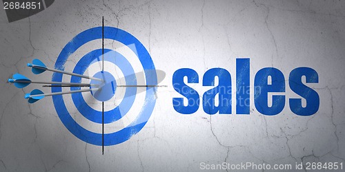 Image of Advertising concept: target and Sales on wall background