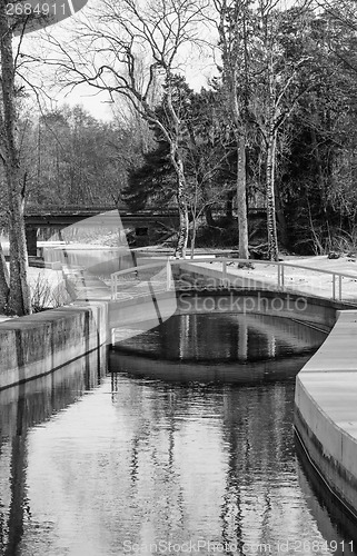 Image of Bridge across the canal in the spring