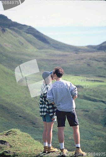 Image of Couple on mountain top.