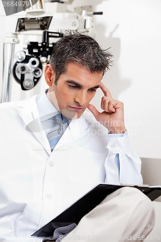 Image of Serious Optometrist At Work