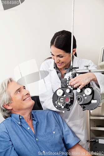 Image of Optometrist And Patient Before Eye Checkup