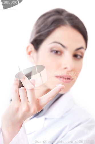 Image of Optometrist Holding Contact Lens