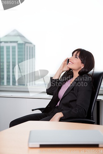 Image of Business Woman Talking on Cell Phone