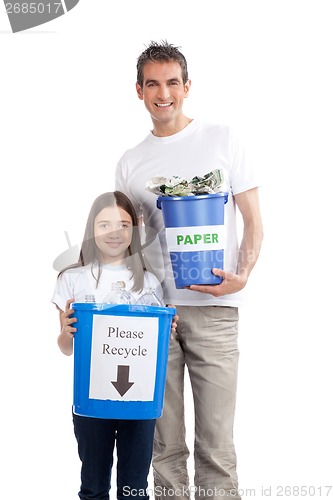 Image of Father, Daughter Holding Recycle Bin