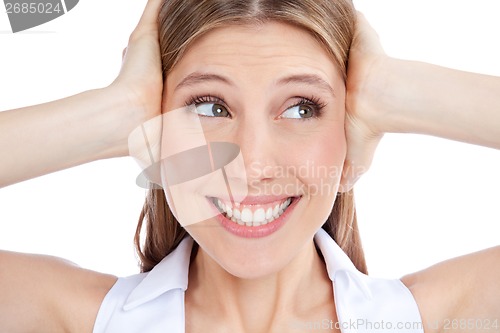 Image of Young Woman Covering Ears