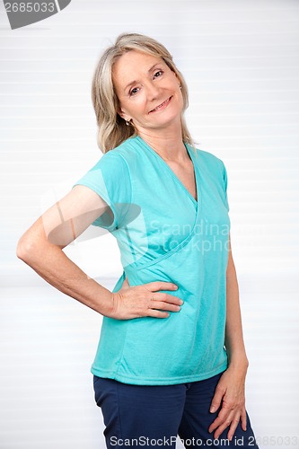 Image of Smiling Mature Woman Posing