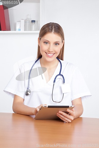 Image of Medical Professional Using Digital Tablet