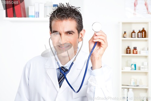 Image of Male Doctor Holding Stethoscope