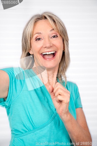 Image of Cheerful Mature Woman