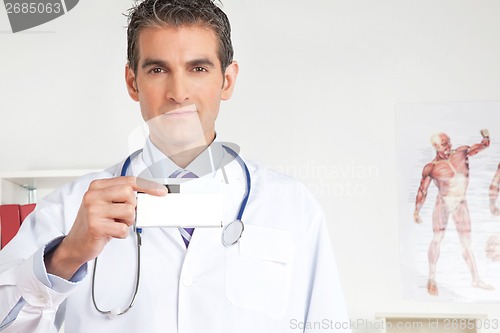 Image of Doctor Holding a Medicine Packet