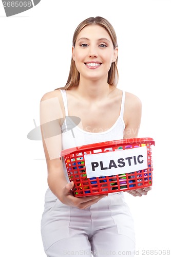 Image of Woman Holding Red Basket