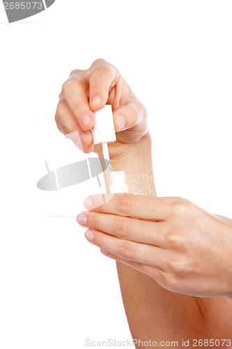 Image of Woman Hand Holding White Nailpolish