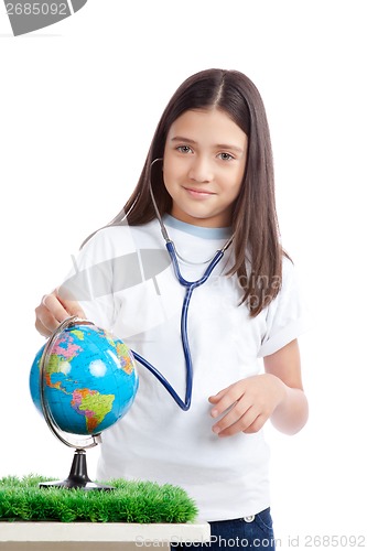 Image of Girl with Stethoscope and Globe