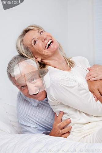 Image of Senior Couple Laughing Together