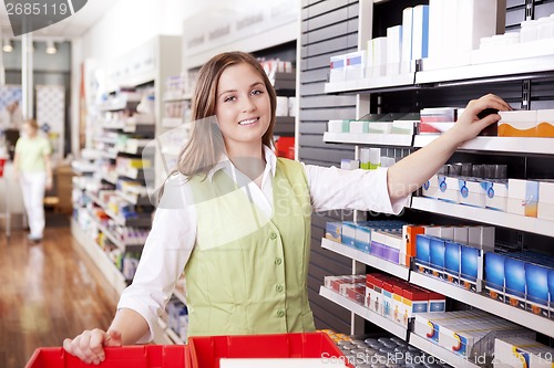 Image of Pharmacist Looking For Medicine