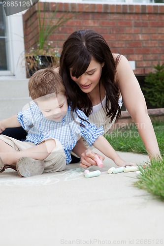 Image of Mother Drawing With Chalk On Sidewalk With Son