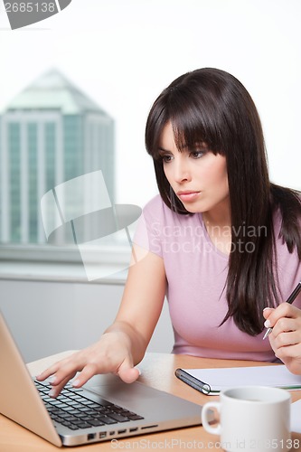 Image of Young Business Woman with Computer